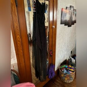 Its a black short dress fromWindsor it has a train and a bow in the back